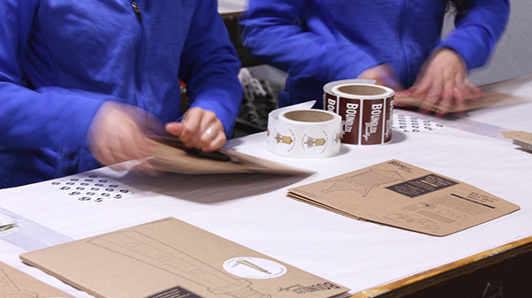 FFI workers assemble kits for a contract assembler for the U.S. Army.