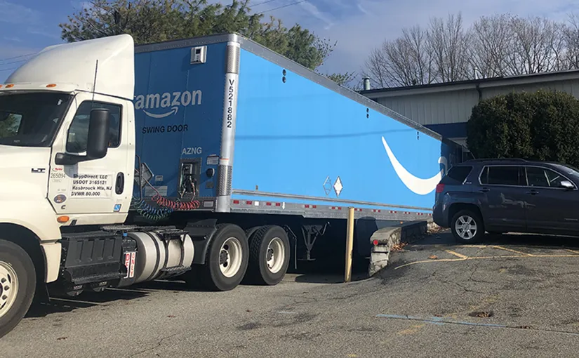 A photo of a blue Amazon Fulfillment Truck.